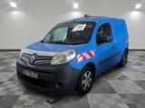 a picture of a blue van parked in a garage