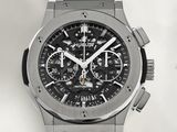 the watch is made of stainless steel and has a black dial