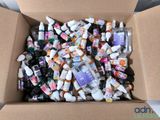 a cardboard box full of toothbrushes and toothpaste