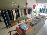 a table with a lot of clothes on it