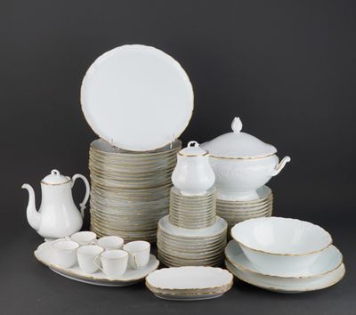 a lot of plates and cups on the table