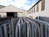 a lot of metal pipes that are in a building