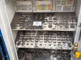 a cabinet full of tools that are on display