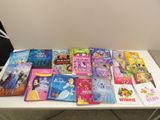 a lot of books on a white table