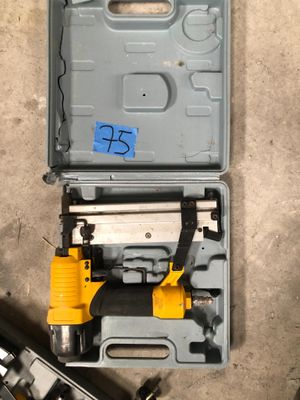 a tool box that has a hammer and a screwdriver in it
