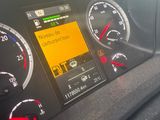 a car dashboard with various gauges and numbers on it