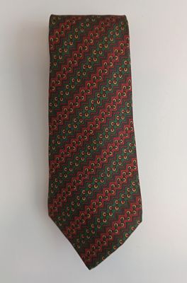 a close up of a tie hanging on a wall