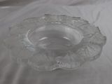 a clear glass bowl on a white table cloth