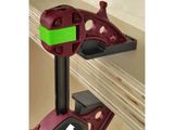 a close up of a clamp on a piece of wood
