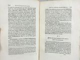someone is holding a book open to a page with a picture on it