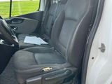 a white van with black seats in the back of it