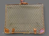 an image of a piece of luggage on a gray background
