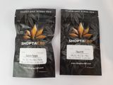two bags of cbd are sitting side by side on a white surface