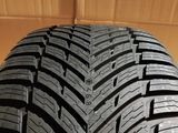 a close up of a tire on a wooden surface