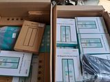 a box full of boxes of electronic equipment in a room