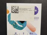 a smart watch with a qr code attached to it