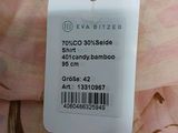 an image of a woman ' s dress with a price tag attached to it
