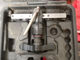 a tool in a case that is sitting on a table