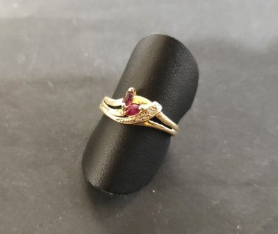 Bague en or 18K (poinçon 750) sertie de deux pierres rouges … - Photo 1