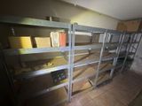 a room that has some shelves and boxes on it