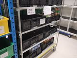 a large rack with many bottles and containers on it