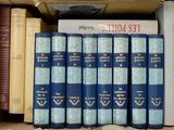 a box full of books that are sitting on top of a table