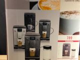 a box with a coffee machine on it on a table