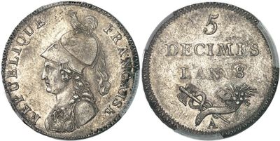 a close up of a silver coin with a woman on it