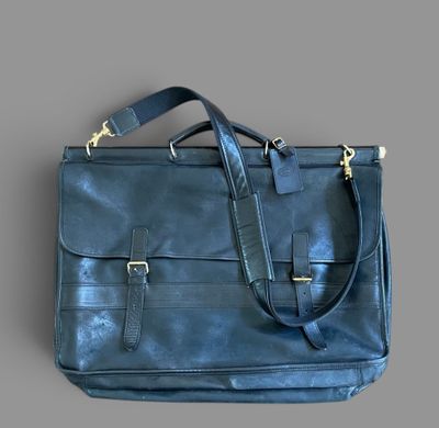 blue leather briefcase bag with strap and shoulder strap