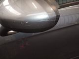 a side view mirror on the side of a car