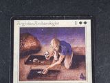 a card with a picture of a woman kneeling down on the ground