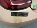 a sticker that says vauto on the back of a car