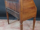 an image of a small wooden desk with a drawer on top of it