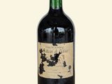 a bottle of wine that is sitting on a table