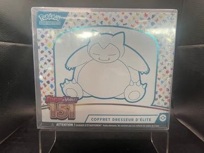 a close up of a pokemon trading card on display in a store