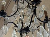 a chandelier hanging from the ceiling in a room