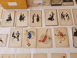 a lot of cards that are on the table