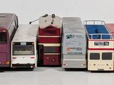 a lot of buses that are lined up in a row