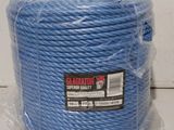 a roll of blue rope wrapped in plastic on top of a table