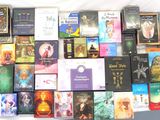 a lot of books that are on a table