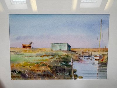 une image d'un tableau accroché au mur d'une pièce