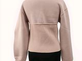 a picture of a women ' s sweater on a mannequin mannequin