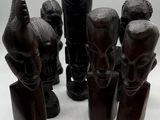 a group of wooden sculptures of different shapes and sizes
