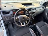 the interior of a car with a steering wheel and dashboard