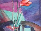 tableau représentant trois tulipes rouges dans un vase en verre posé sur une table