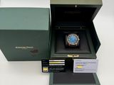 a box with a watch inside of it on a table