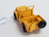 a yellow toy truck with a price tag attached to it