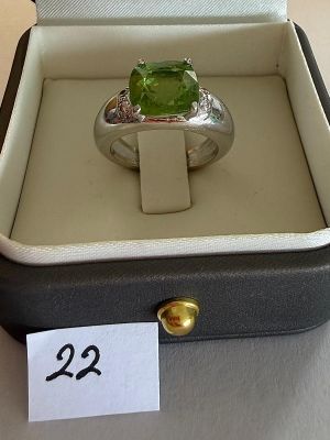 an image of a ring in a box with a price tag on it