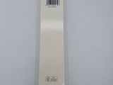 a white box with a barcode on it sitting on a table