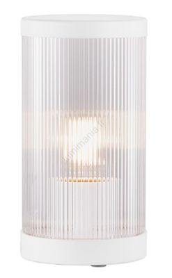 une lampe de table blanche surmontée d'un abat-jour en verre transparent